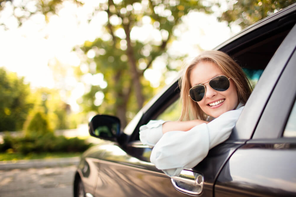 Young woman in car