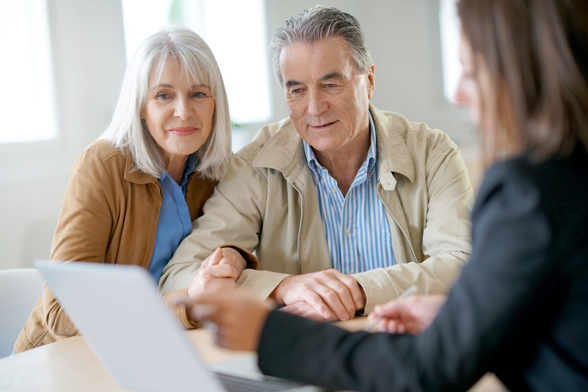 Older couple looking at laptop