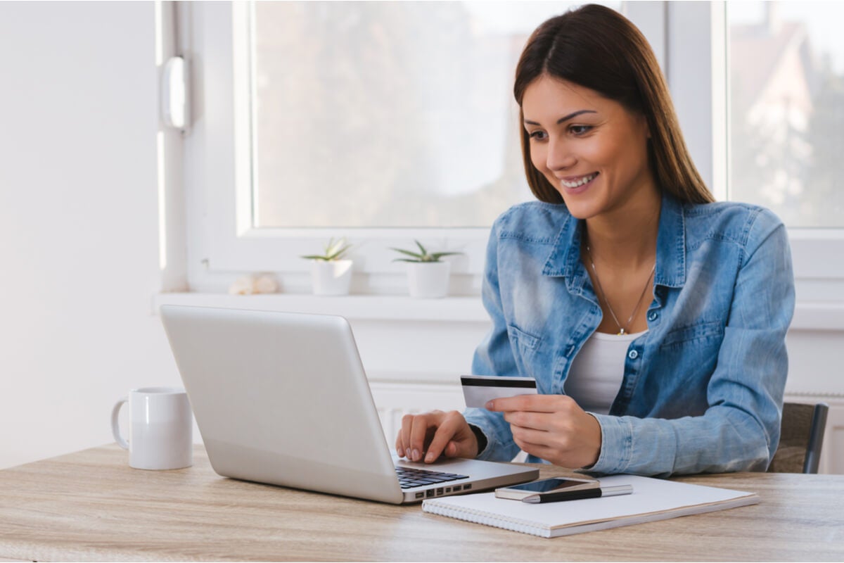 Woman sitting at desk with laptop