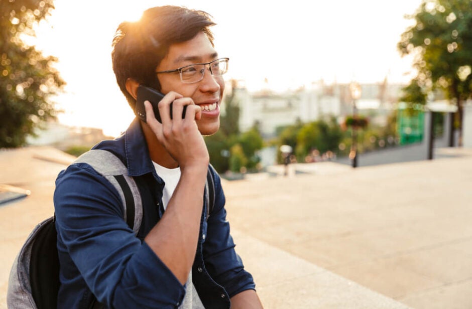 Man Talking On Phone