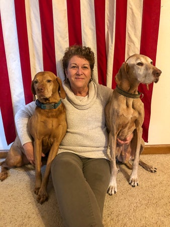 Nancy Rowan with two dogs