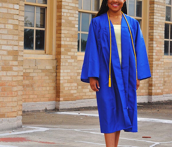 Nia Lindsey in blue cap and gown