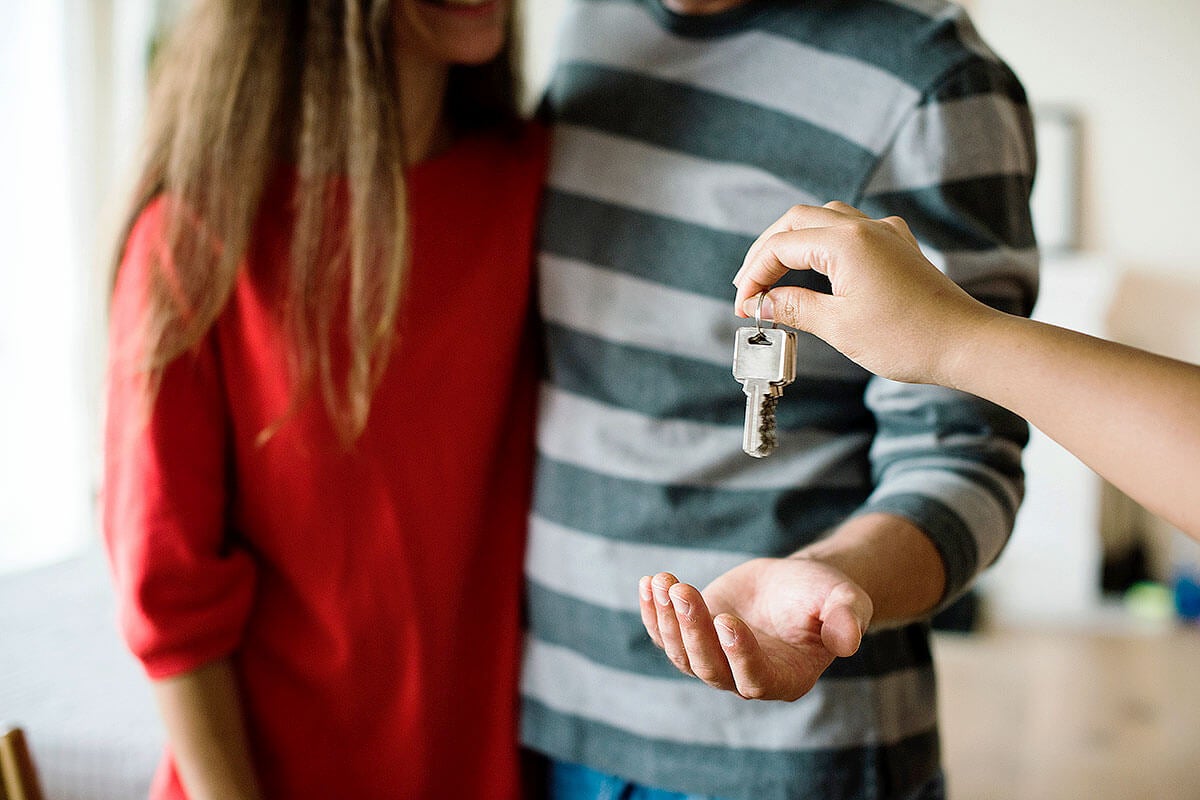 Couple receiving house key