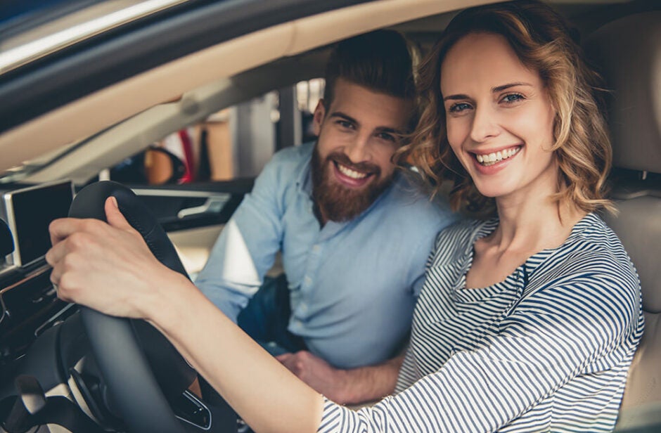 Woman and man inside a car