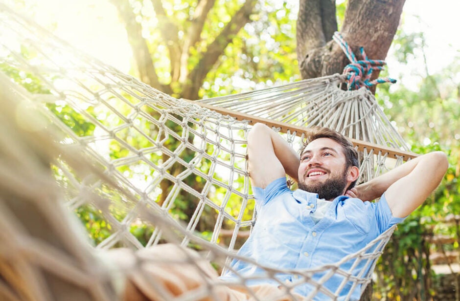 Man laying in a hammock