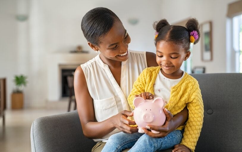 Mother and Child with Piggy Bank