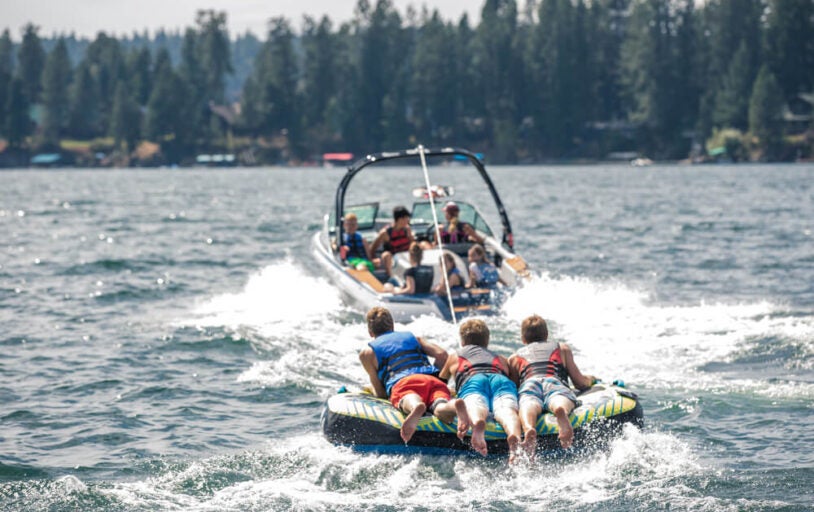 Family boating at lake