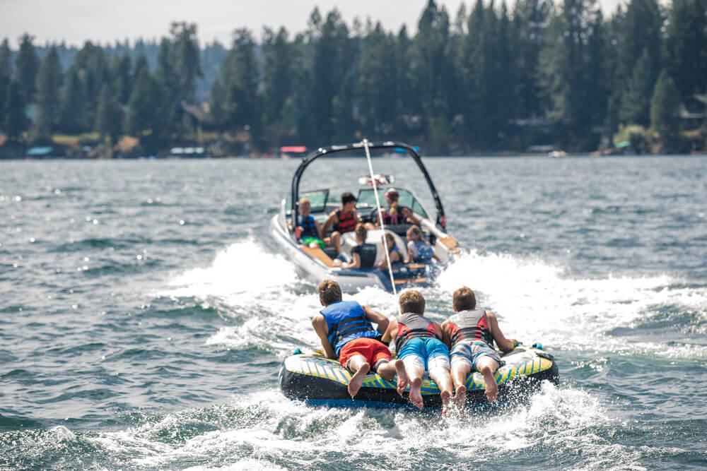 Family boating at lake