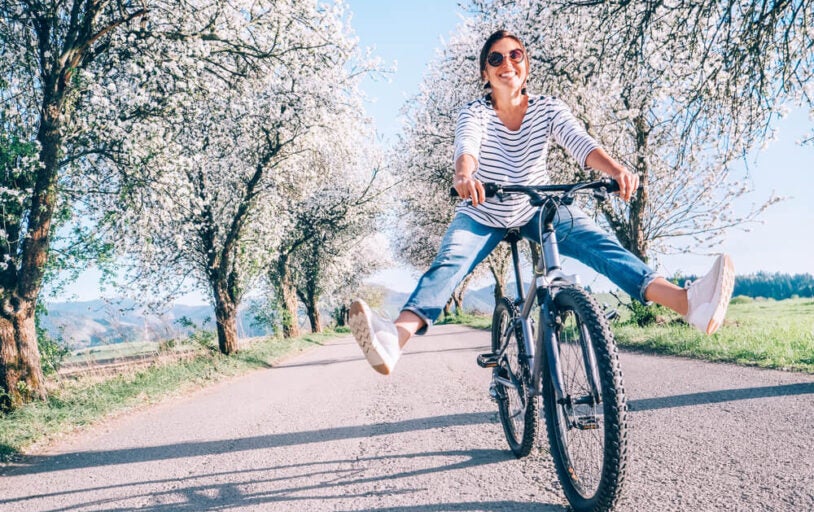 Spring, woman riding bike