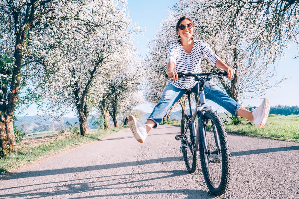 Spring, woman riding bike
