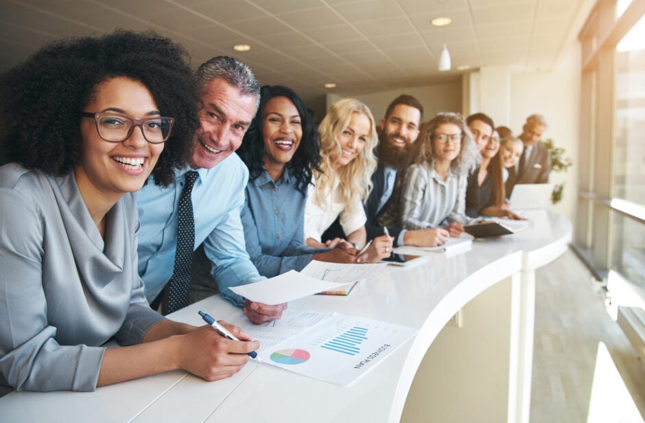 Happy coworkers smiling