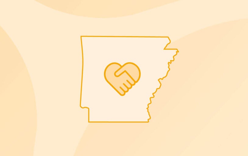 Outline of State of Arkansas with icon of hands holding