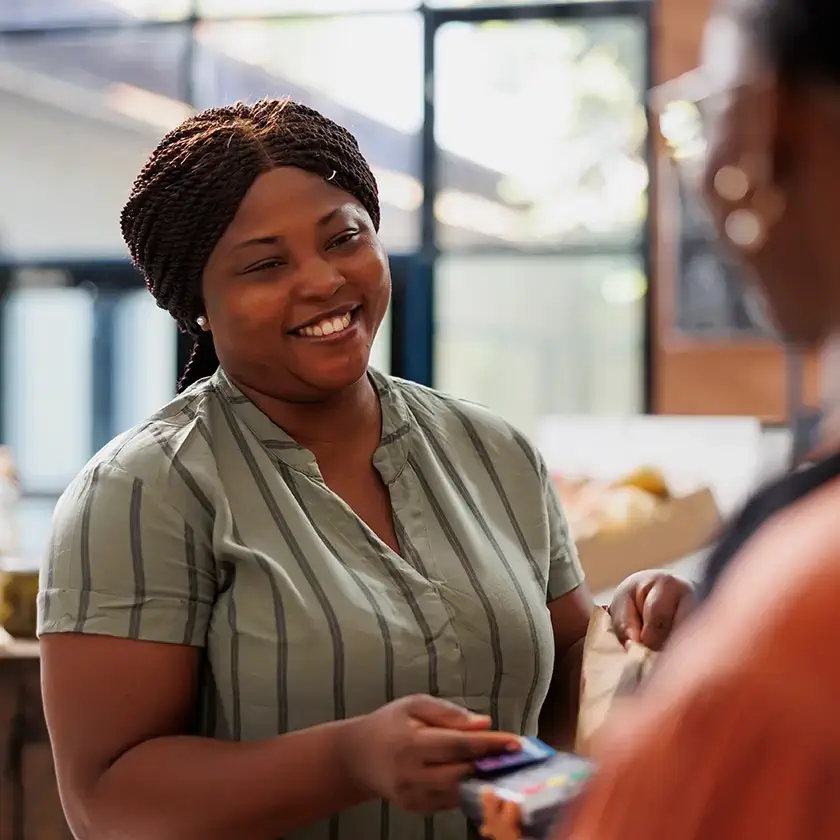 Elite Checking. Woman handing card